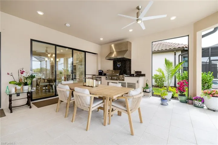 Dining space with a ceiling fan and healthy amount of natural light