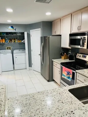 Kitchen, pantry and washer and dryer