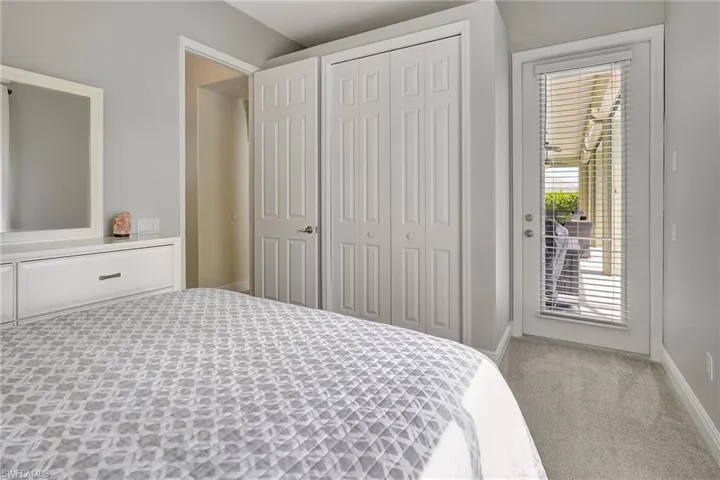 bedroom featuring access to outside