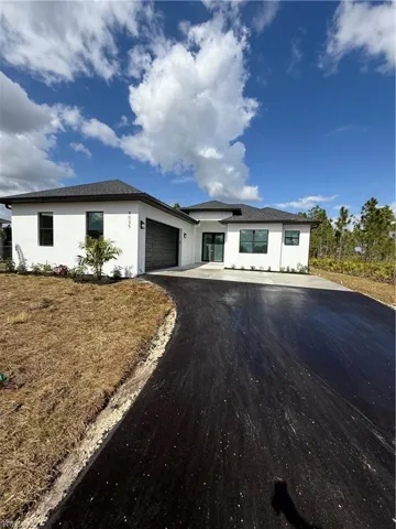 View of front of house with a garage