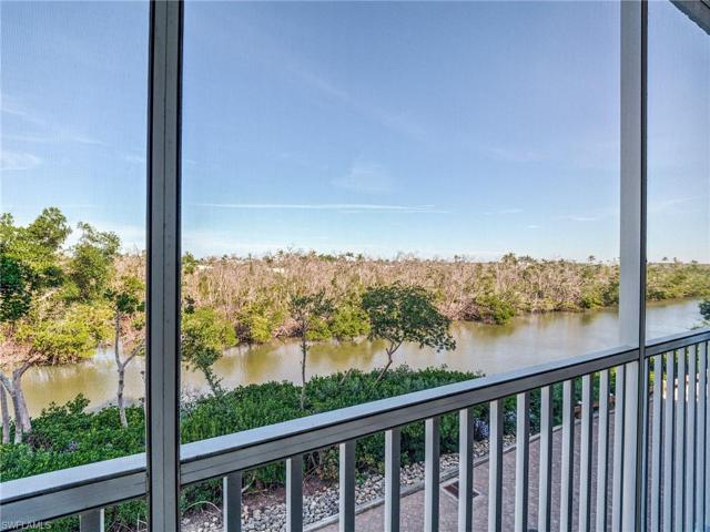 Breathtaking waterfront and natural preserve views from floor to ceiling glass and screened lanai, an extension of the living space for a private and tranquil place to relax.
