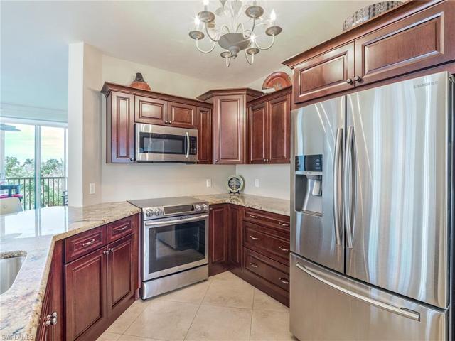 Rich custom cabinetry, granite counters and a counter height breakfast bar. Full suite of Stainless Steel appliances complete with 2 icemakers!