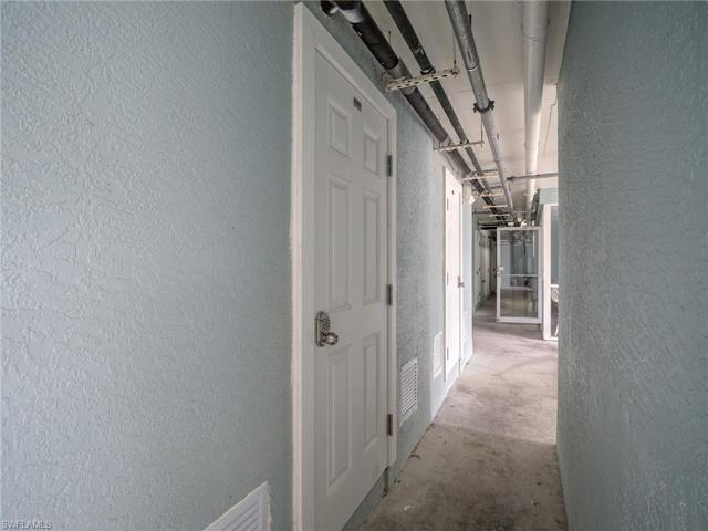 Plenty of extra space in this assigned storage room with key or code lock system near underbuilding designated parking spot.