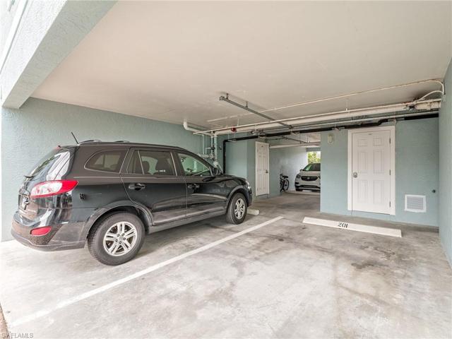 Designated underbuilding parking space in close proximity to secure lobby with elevator, stairwell and assigned storage room with key and code lock system.