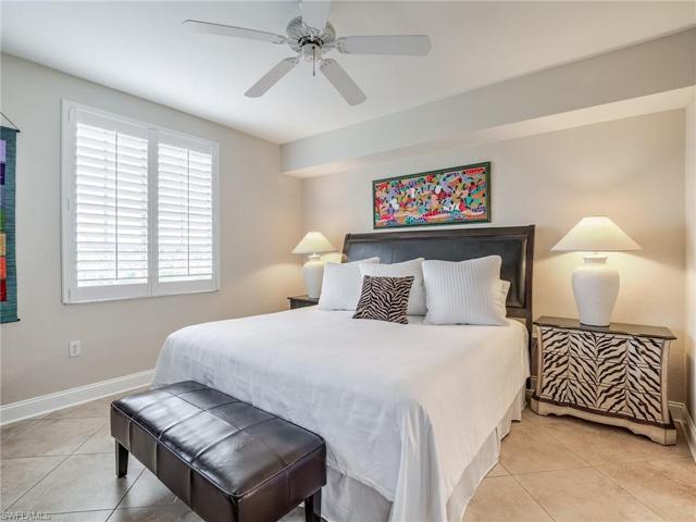 Spacious Primary owner's suite with separate access to your balcony and views of waterway & preserve