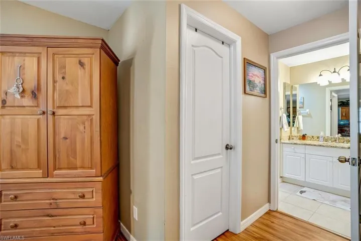 Hallway featuring light wood-type flooring