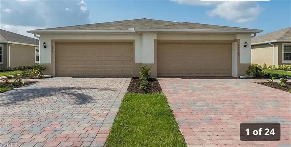 Garage with decorative driveway