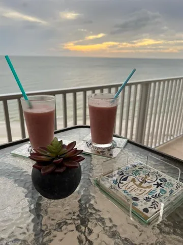 Balcony at dusk with a water view