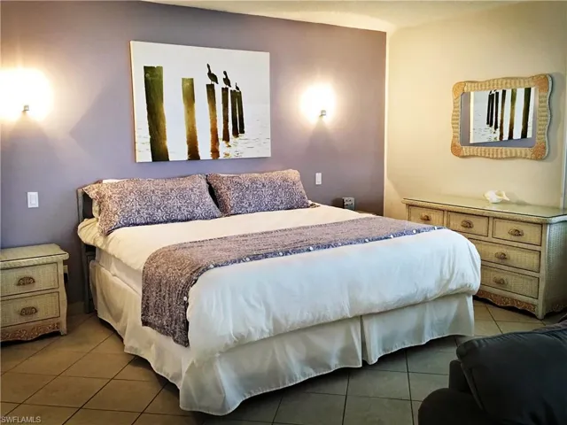 Bedroom with tile patterned flooring