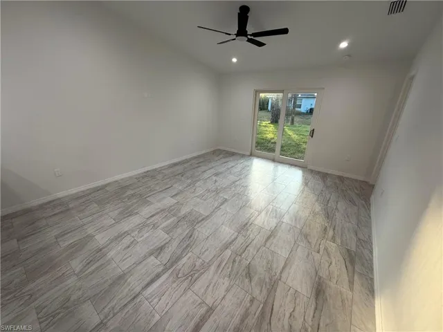 Unfurnished room featuring ceiling fan and recessed lighting