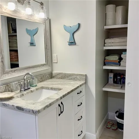 Bathroom with vanity and light wood-style flooring