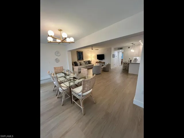 Previously Furnished Dining area towards living area and kitchen