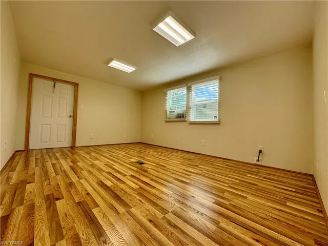 Empty room featuring light wood finished floors