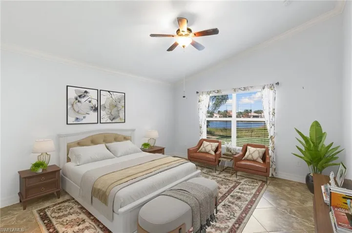 Master bedroom with lake view and bathroom.