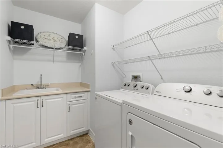 Laundry center with storage.