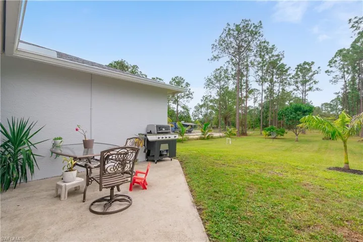 View of yard with a patio area