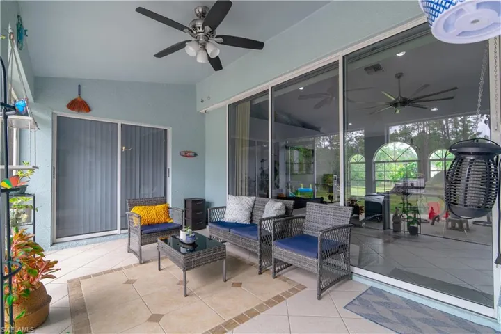 View of patio / terrace featuring an outdoor living space and ceiling fan
