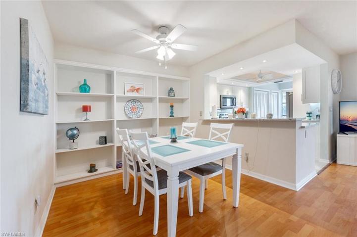 Pass through to formal dining with built in open shelves
