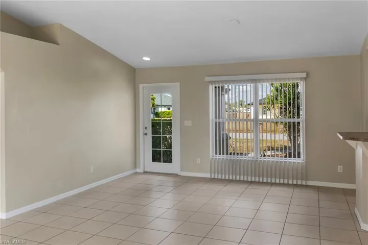 Spare room featuring light tile patterned floors and recessed lighting