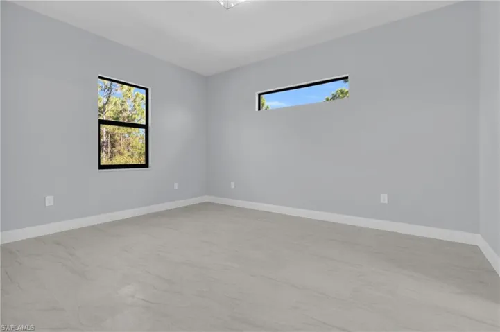 Spare room with baseboards