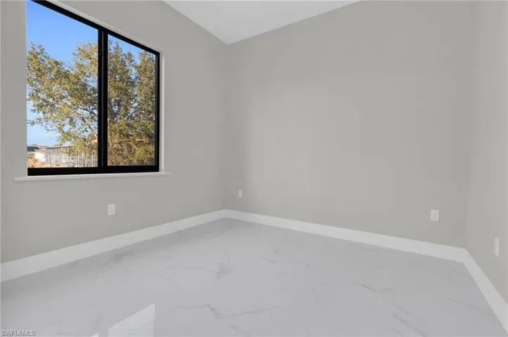 Empty room with marble finish floors