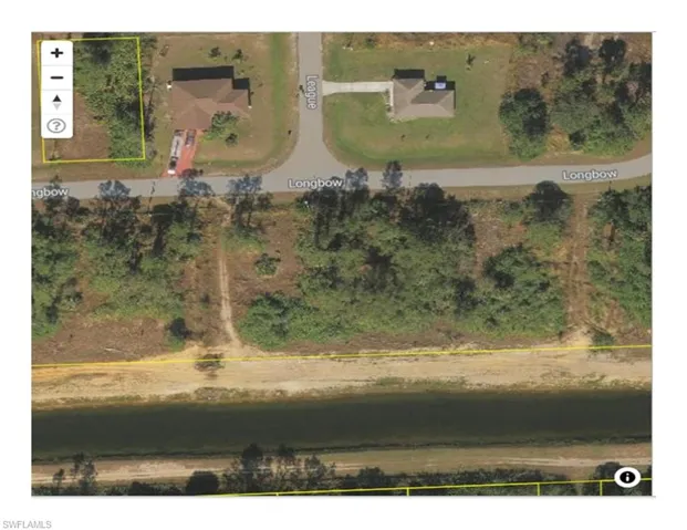 Aerial map of property and surrounding area featuring property parcel outlined