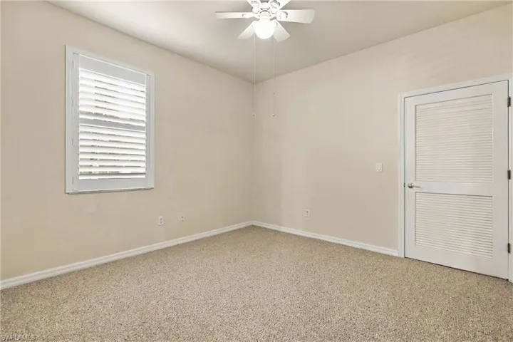 Guest bedroom with walk-in closet