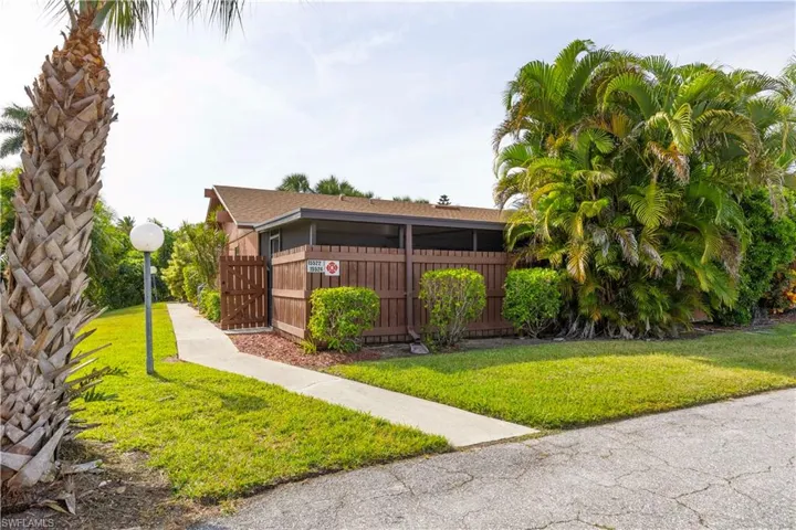 View of front of property with a fenced front yard