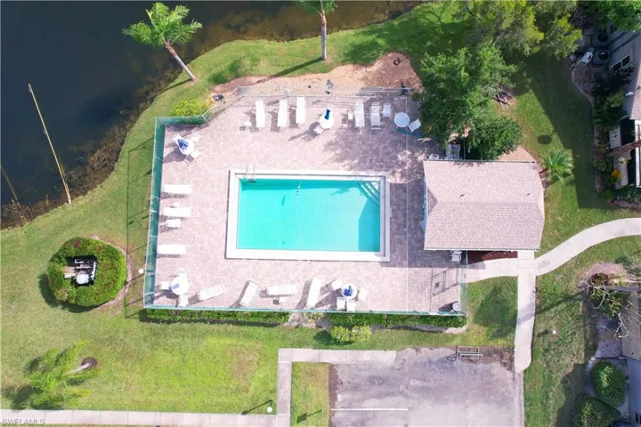 Drone / aerial view of a pool area