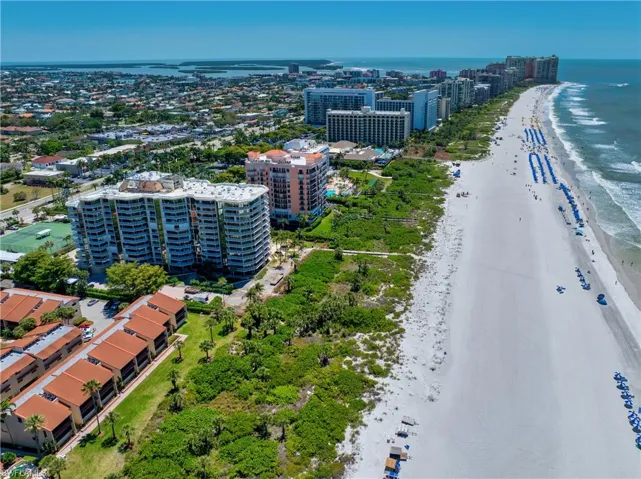 View of urban area with waterfront with a beach