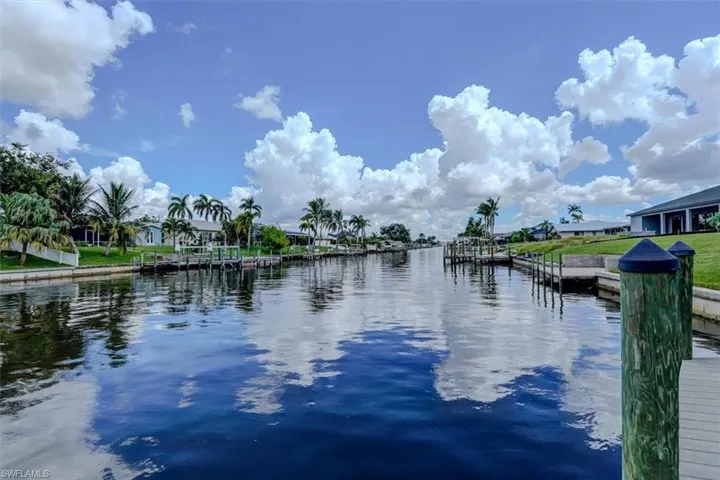 View of water feature with a boat dock