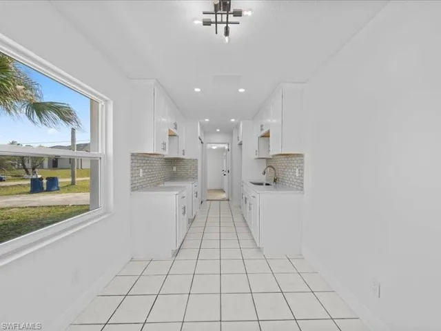 2253  10th  CT, Lehigh Acres, FL 33936