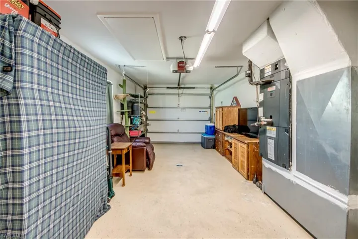 Garage with heating unit and a garage door opener