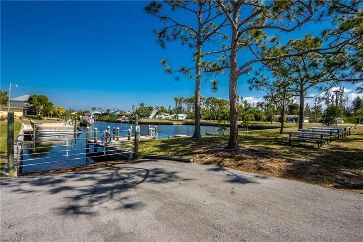Dock with a boat ramp and a water view