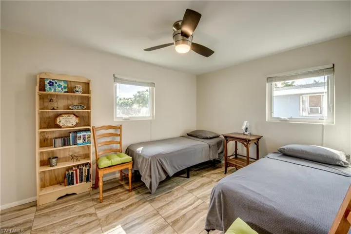 Bedroom featuring a ceiling fan