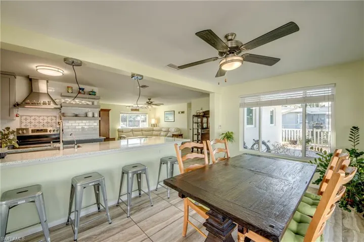 Dining room with a ceiling fan
