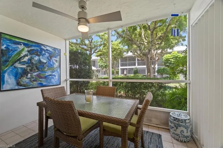 Sunroom with tile patterned flooring