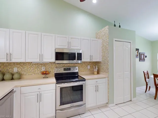 5512  Whitten  DR, Naples, FL 34104