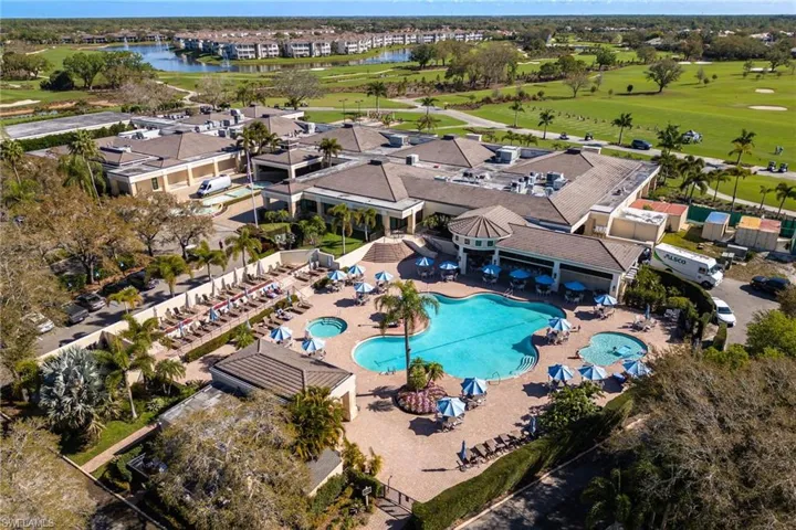 Aerial view of a nearby body of water and a golf course