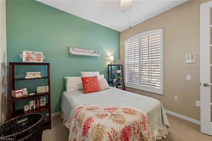 2nd guest bedroom with French door that could also be a great home office space