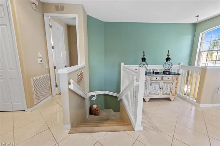 2 Story entrance up to 2nd floor with open Dining Room