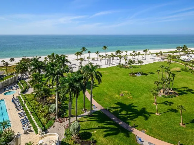 From the lanai, a beautiful view down to pool and Park Shore beach path and path.