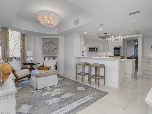 Alongside chic kitchen.