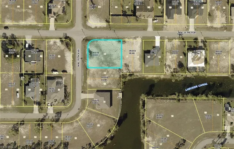 Aerial view of property's location featuring property parcel outlined