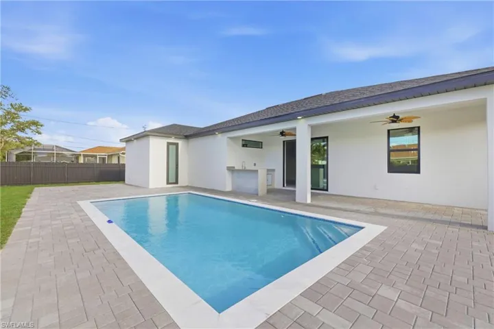 View of pool featuring patio surround