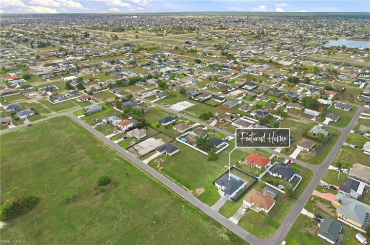 View of property location featuring nearby suburban area