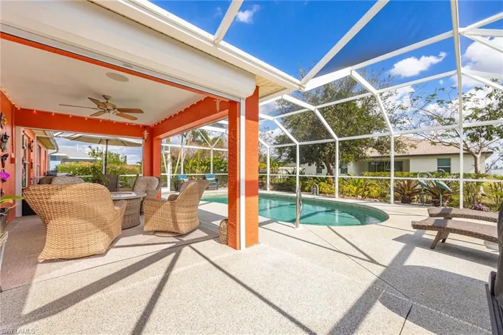 View of sparkling pool & lanai