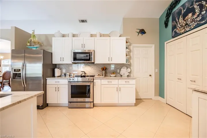 Updated kitchen with tons of cabinetry & a pantry