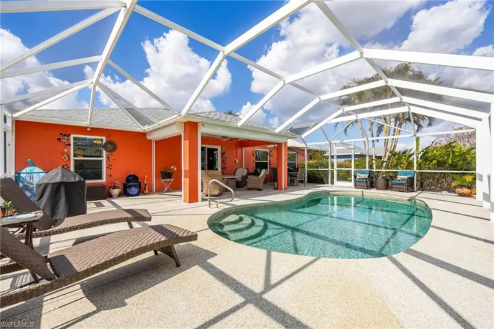 Spacious screened lanai with heated, salt water pool