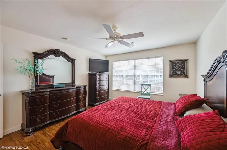 MAIN BEDROOM WITH VIEW OF LAKE